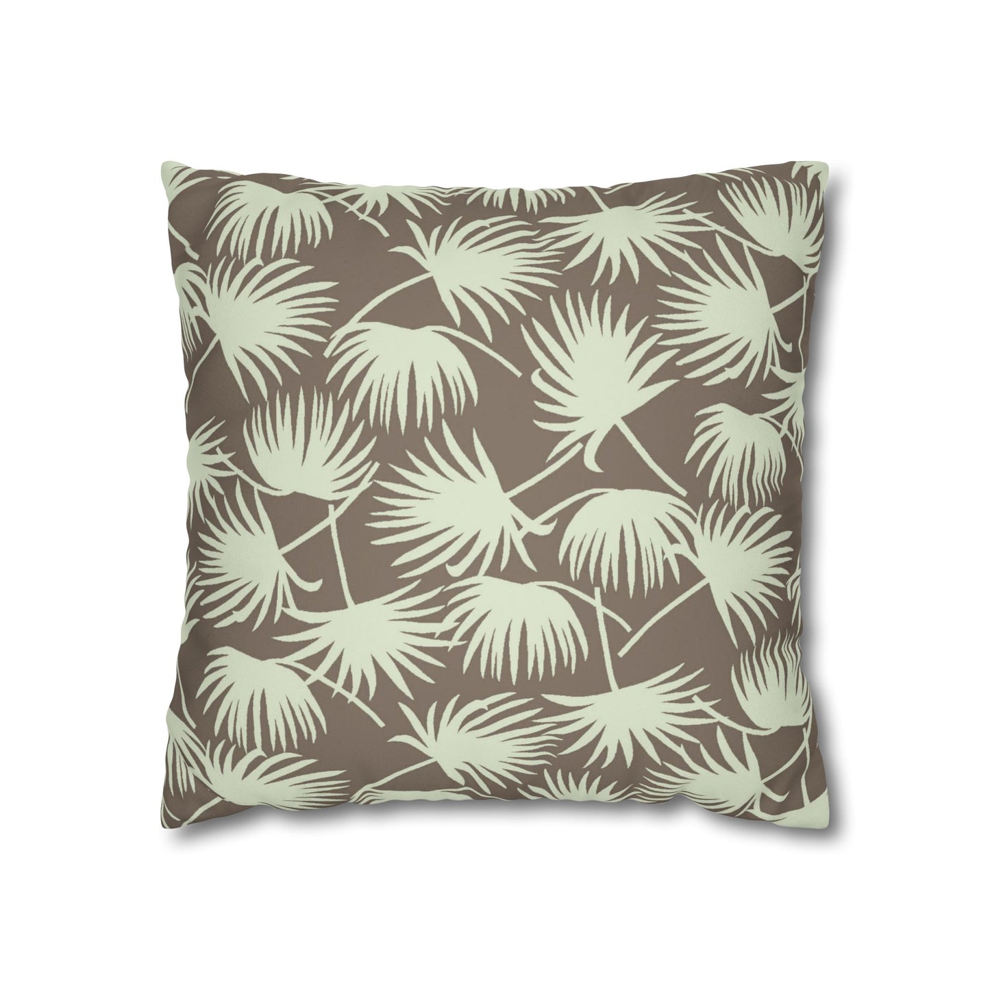 A square throw pillow featuring a repeating palm leaf pattern in a light sage green on a warm taupe-brown background, shown against a plain white studio background.
