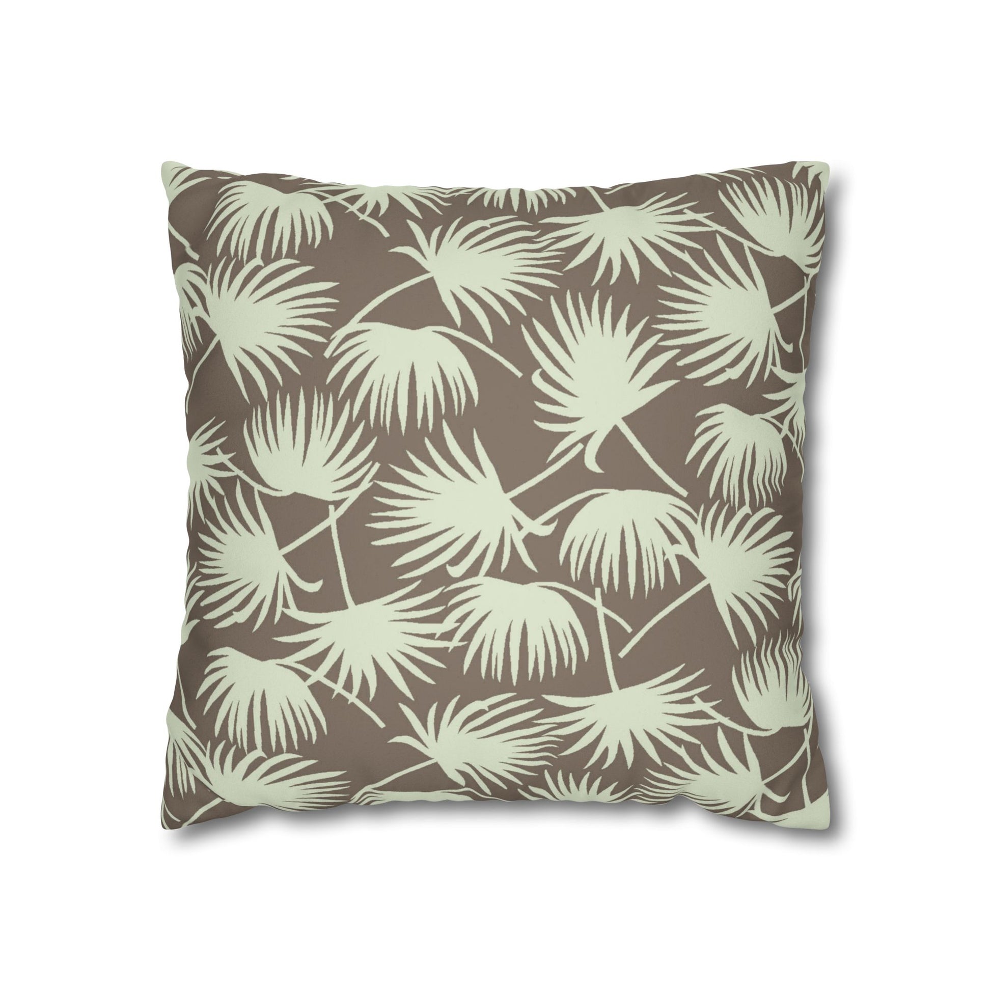 A square throw pillow featuring a repeating palm leaf pattern in a light sage green on a warm taupe-brown background, shown against a plain white studio background.