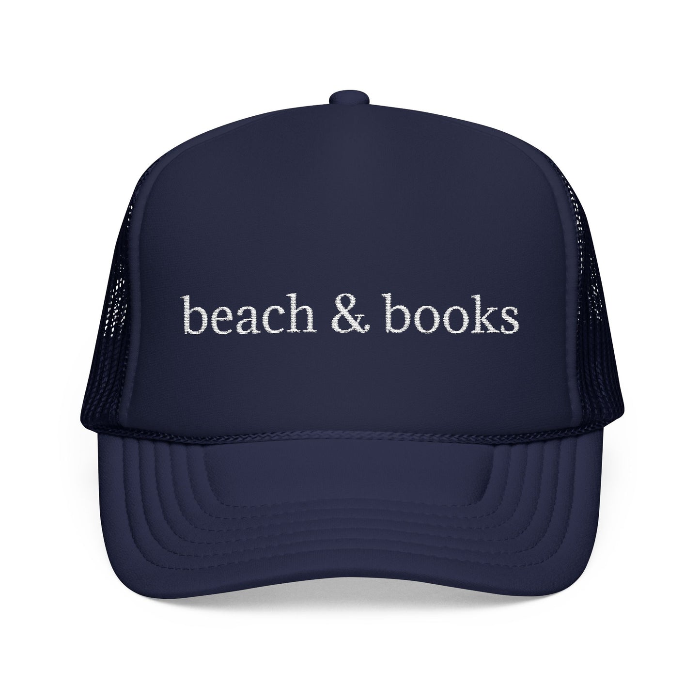Navy trucker hat with white embroidery 'beach & books'