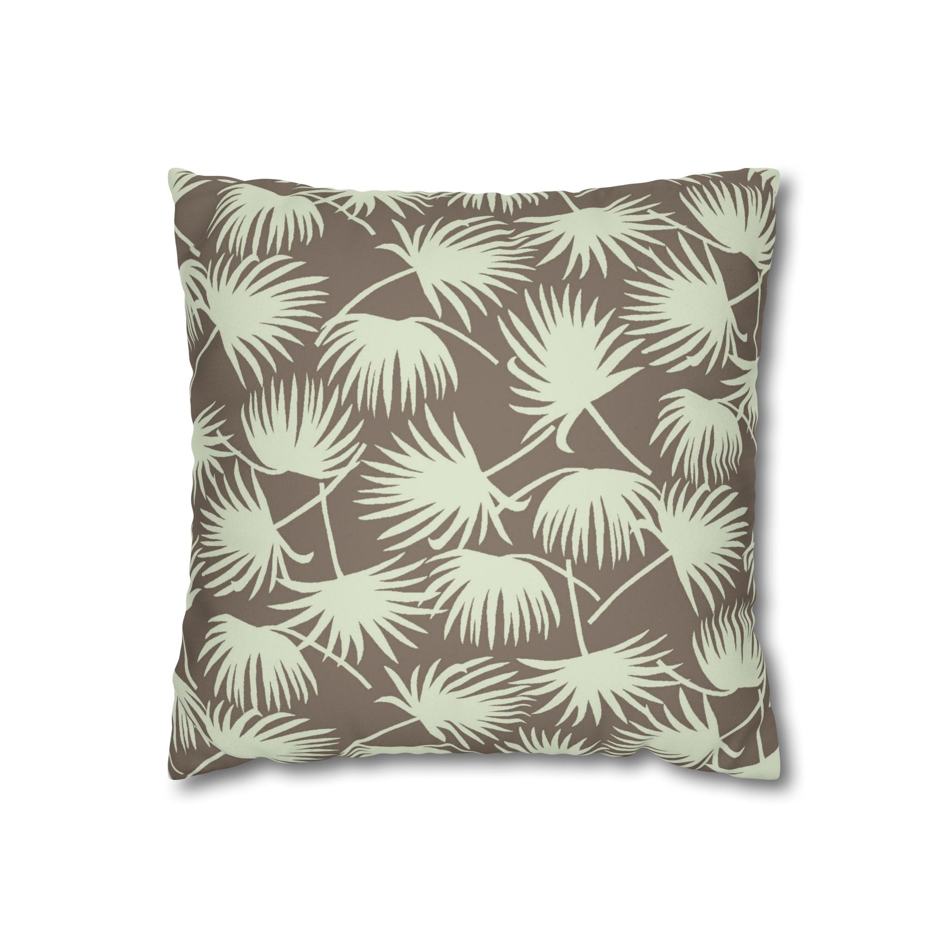 A square throw pillow featuring an all-over palm frond pattern in sage green on a warm taupe-brown background, shown against a plain white studio background.