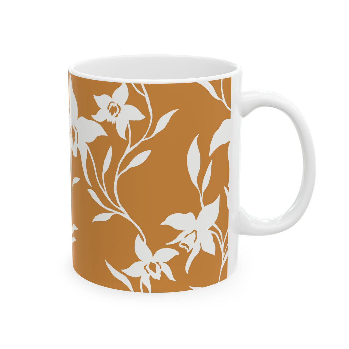 A white ceramic mug featuring a warm terracotta orange floral pattern with white orchid blossoms and leaves, shown against a plain white background.