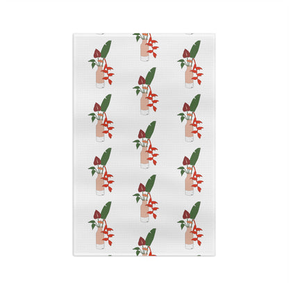 Anthurium Bouquet Hawaiʻi kitchen towel with red anthuriums and tropical green leaves on a neutral background