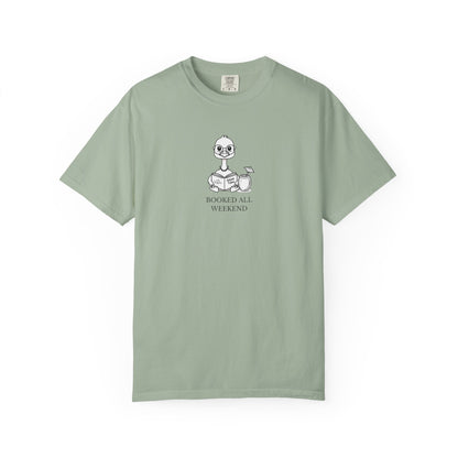 A light green comfort colors t-shirt with design of a nene goose reading a book and text 'booked all weekend' 