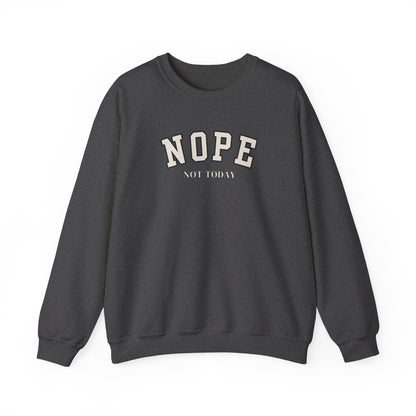 A dark gray crewneck sweatshirt with 'NOPE NOT TODAY' printed on the chest in a varsity-style font, shown against a plain white background.