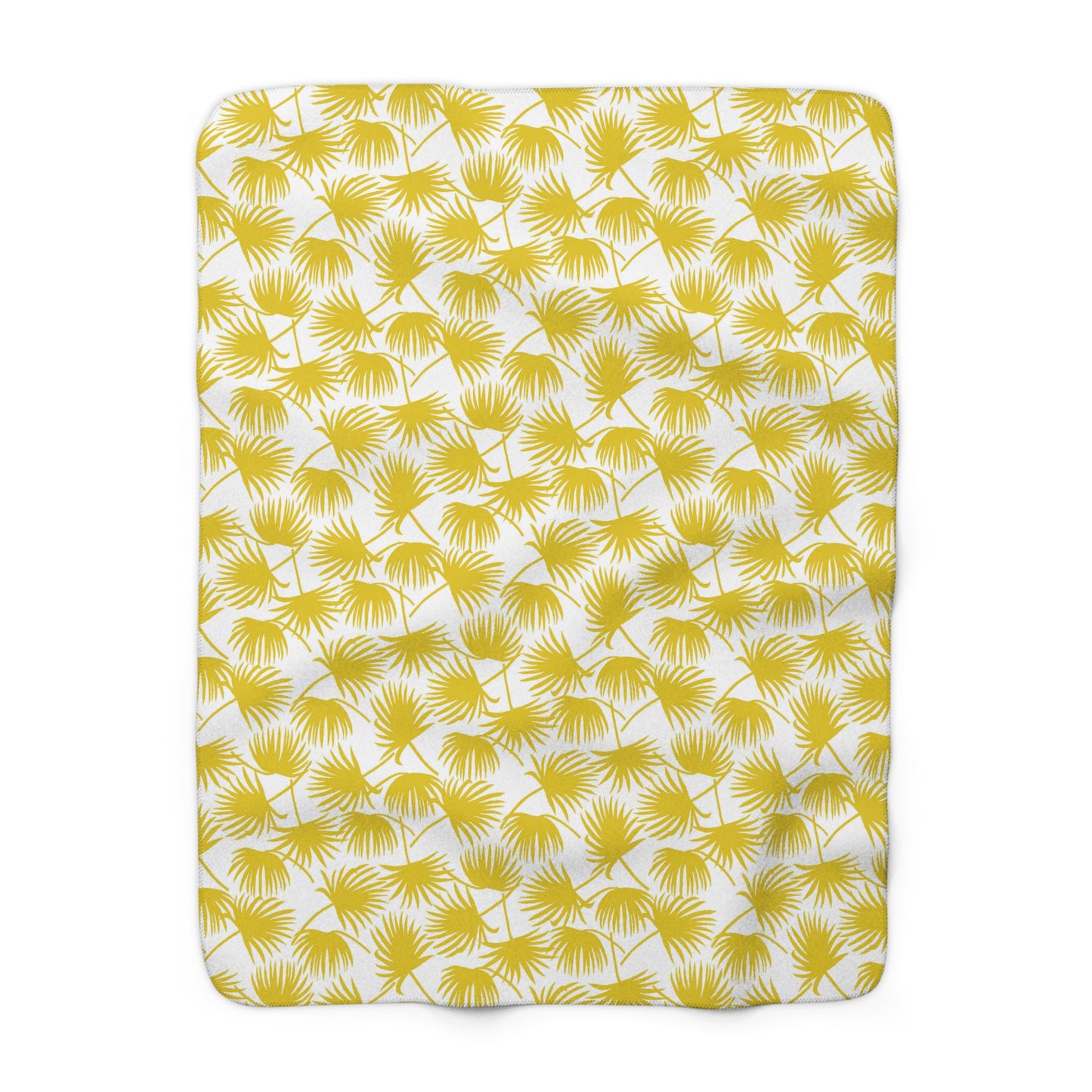 A rectangular throw blanket with a yellow palm frond pattern on a white background, shown flat against a white backdrop.