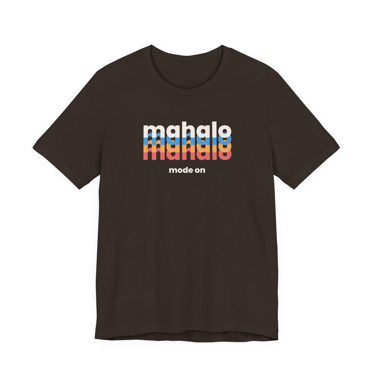 A brown short-sleeve crewneck t-shirt with a retro-style chest graphic reading 'mahalo mode on' in white, blue, and orange lettering, displayed on a solid white background.