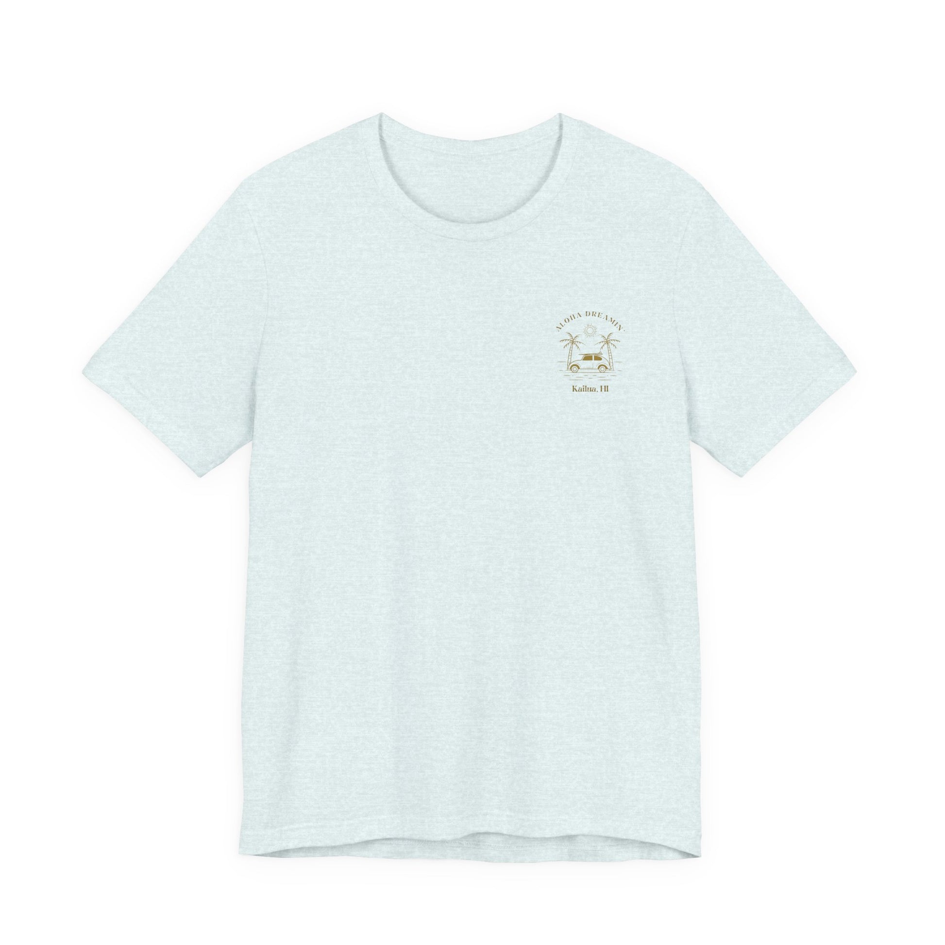 A light blue short-sleeve t-shirt shown from the front, featuring a gold-colored retro graphic of a classic car between two palm trees with the text 'ALOHA DREAMIN'' and 'Kailua, HI' on the left chest.