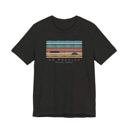 A black short-sleeve crewneck t-shirt featuring a retro sunset graphic on the chest with the text 'NA MOKULUA' and 'KAILUA, HAWAII'.