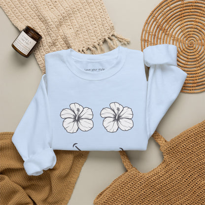 Lt. Blue folded Happy Hibiscus Sweatshirt featuring a cheerful hibiscus flower smile design inspired by island life and aloha style.