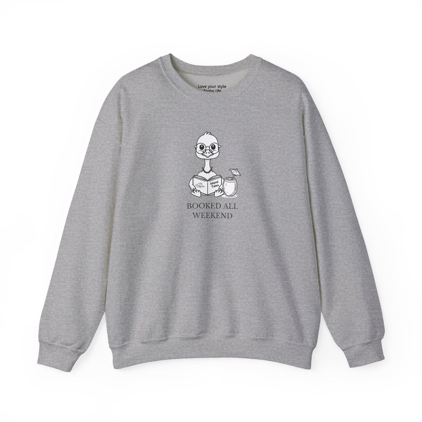 Gray sweatshirt with graphic print of a cartoon nene goose sitting reading a book with a cocktail next to it with text 'BOOKED ALL WEEKEND'