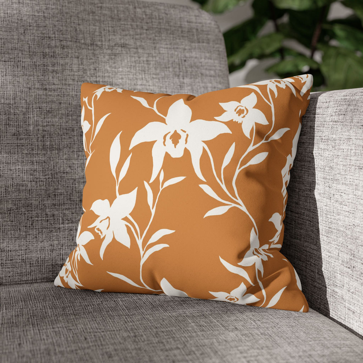 Add warm island style with a caramel orchid faux suede pillow cover featuring a double-sided print and concealed zipper. Available in four sizes.