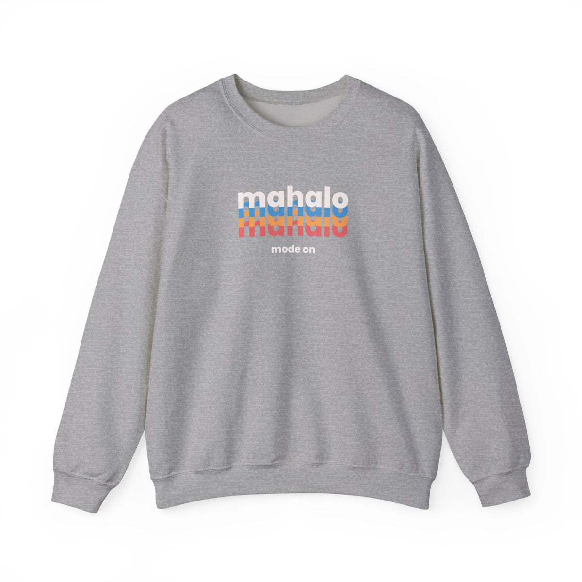A heather gray crewneck sweatshirt featuring a retro-style chest graphic with the word 'mahalo' repeated in white, blue, and orange, with 'made an' printed below in small white text.