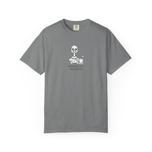 A grey comfort colors t-shirt with design of a nene goose reading a book and text 'booked all weekend' 