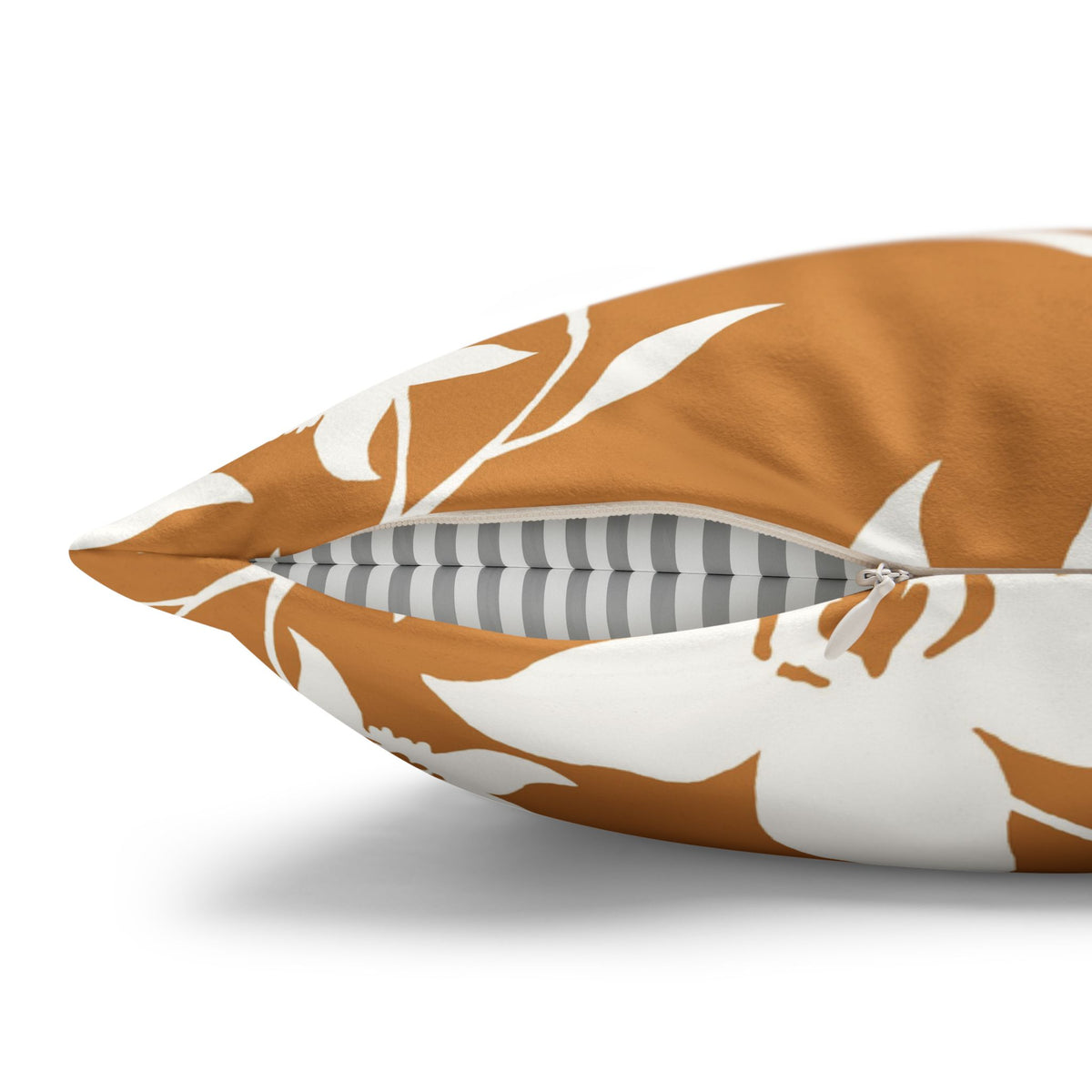 Add warm island style with a caramel orchid faux suede pillow cover featuring a double-sided print and concealed zipper. Available in four sizes.