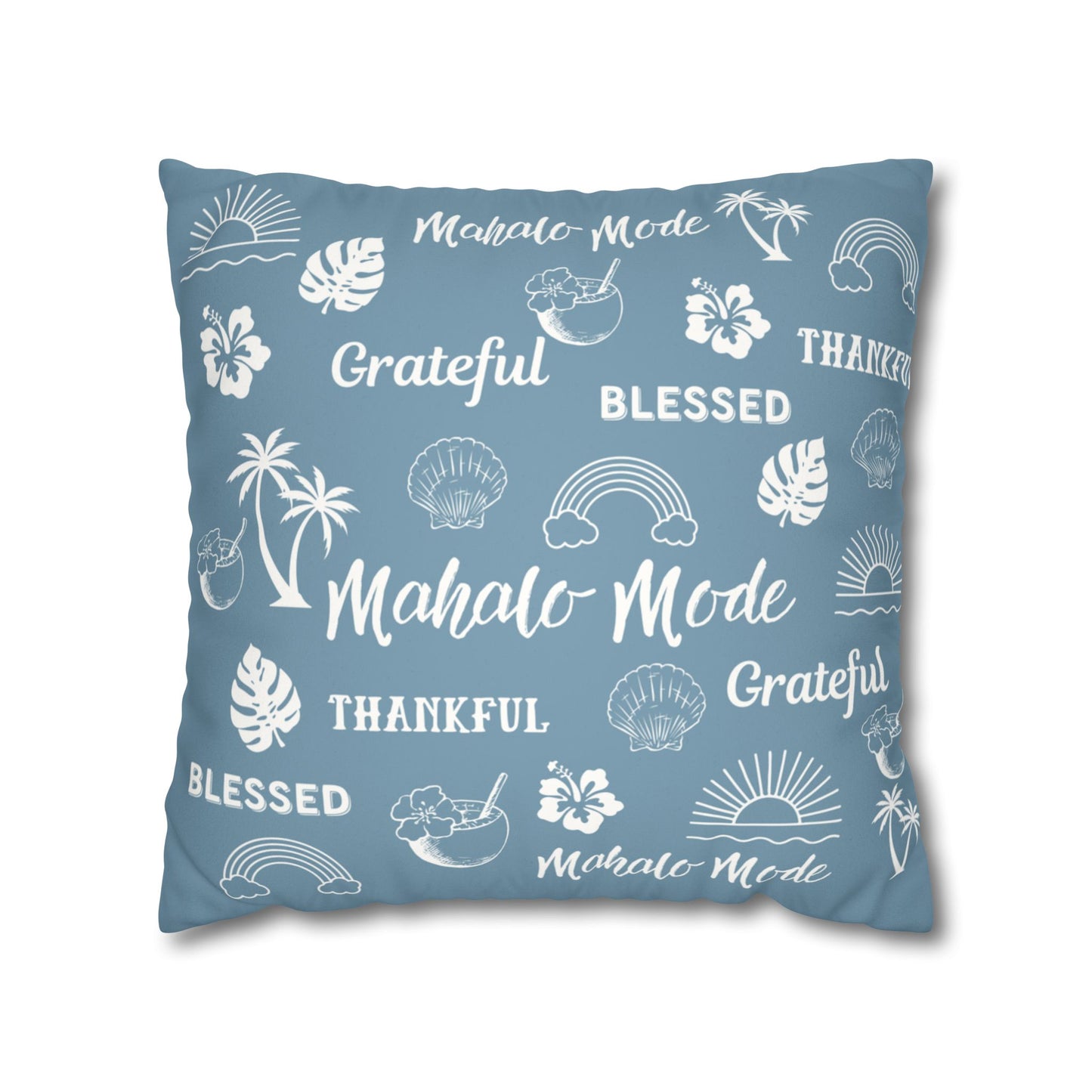 A square throw pillow in dusty blue with a white tropical-themed print featuring the words 'Mahalo Mode', 'Grateful', 'Blessed', and 'Thankful' along with palm trees, hibiscus flowers, and rainbows, shown on a plain white background.