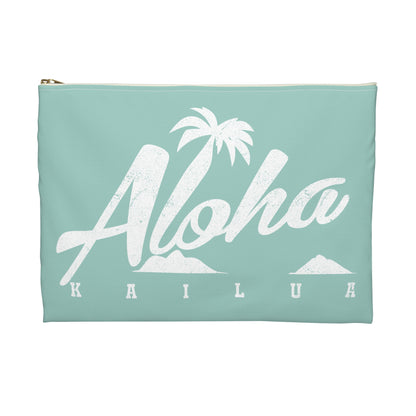 A mint green zippered pouch featuring a white distressed graphic that reads 'Aloha KAILUA' with a palm tree and mokulua islands, shown on a plain white background.