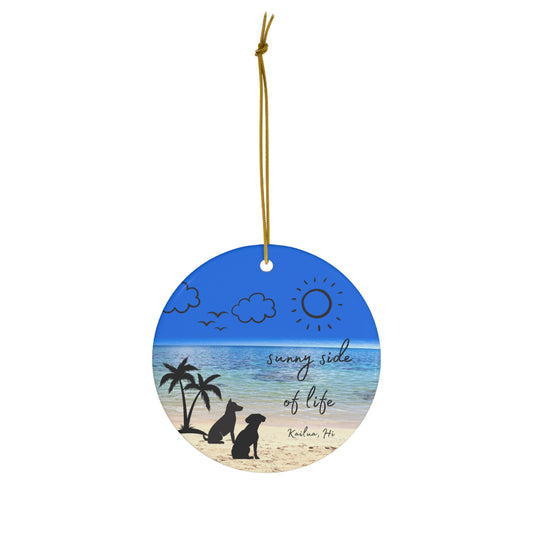 Ceramic ornament with Kailua beach scene, palm trees, two dogs and Sunny Side of Life Kailua HI lettering.