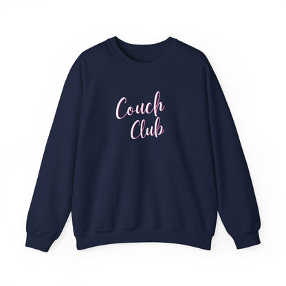 A navy blue crewneck sweatshirt featuring the words 'Couch Club' printed in a light pink cursive font on the chest, displayed against a solid white background.