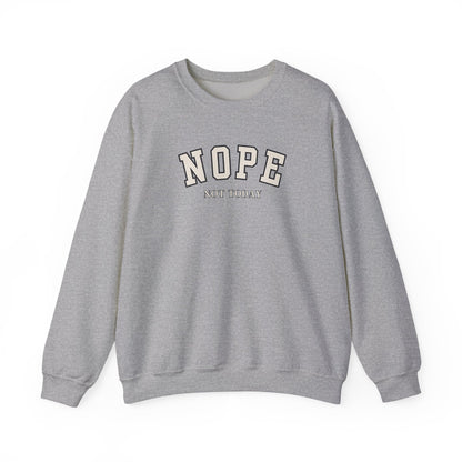 A gray crewneck sweatshirt with 'NOPE NOT TODAY' printed on the chest in a varsity-style font, shown against a plain white background.
