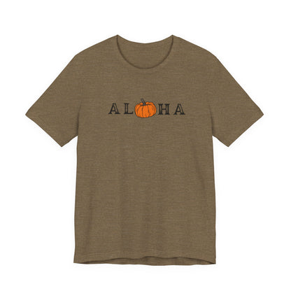 A short-sleeve crewneck t-shirt in heathered brown, featuring the word 'ALOHA' printed across the chest with an orange pumpkin graphic replacing the letter 'O'.