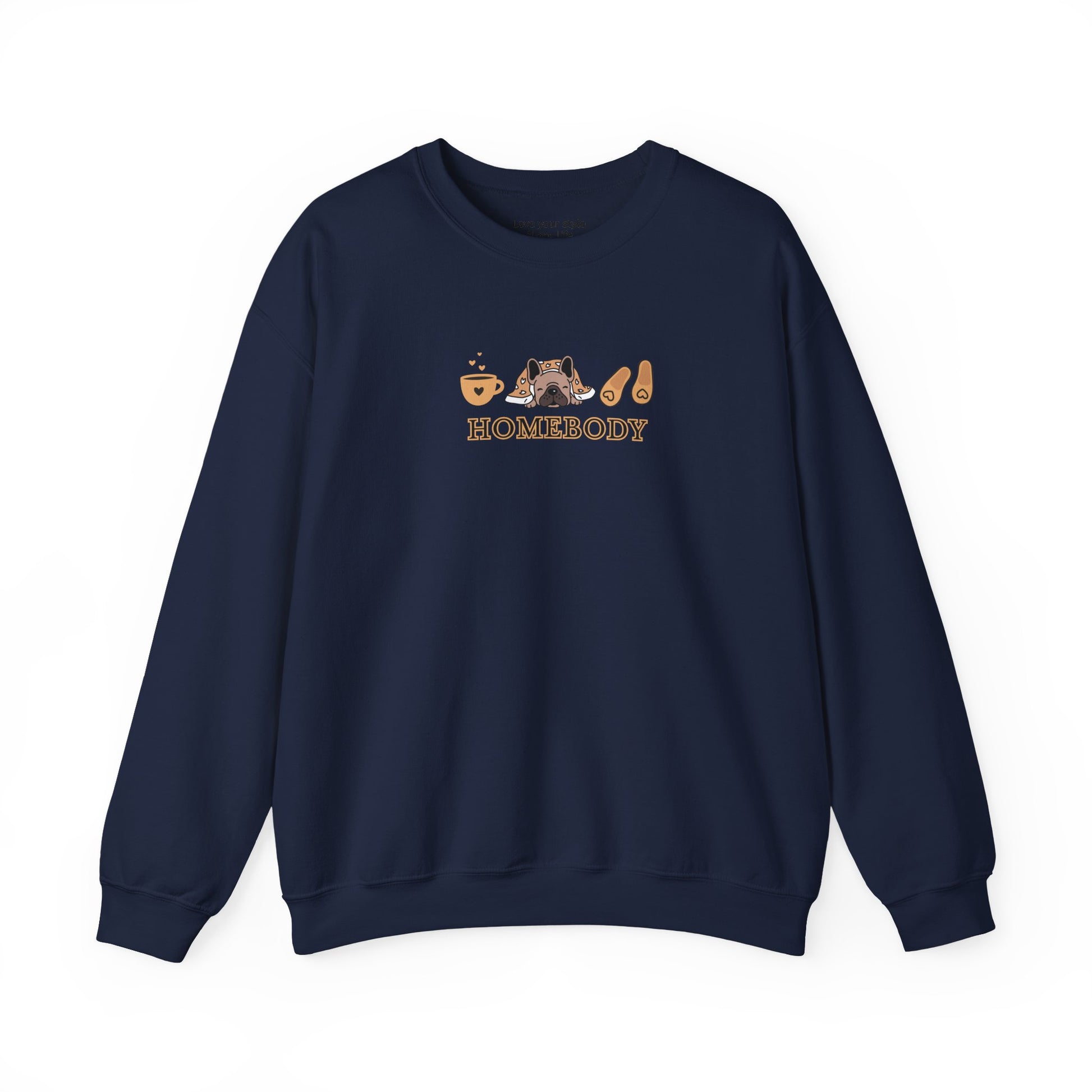 A navy crewneck sweatshirt featuring a central graphic of a dog under a blanket, house slippers, coffee cups and the word 'HOMEBODY' printed below it.