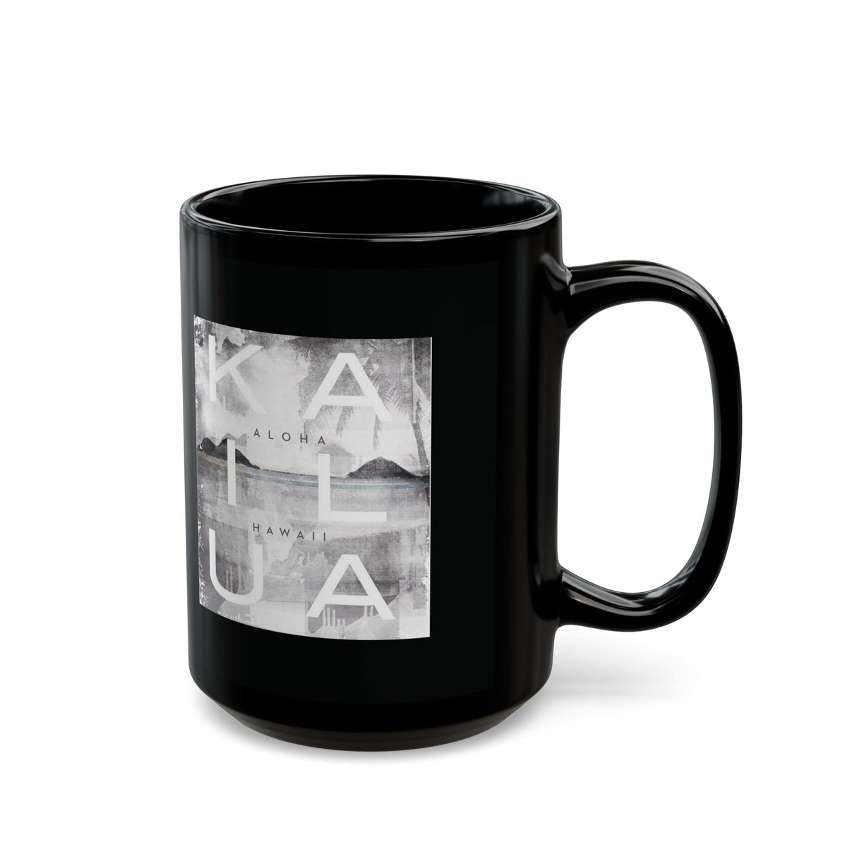 A glossy black ceramic mug featuring a square grayscale graphic print on the front with the words 'KAILUA', 'ALOHA', and 'HAWAII' over a landscape image, shown on a white background.