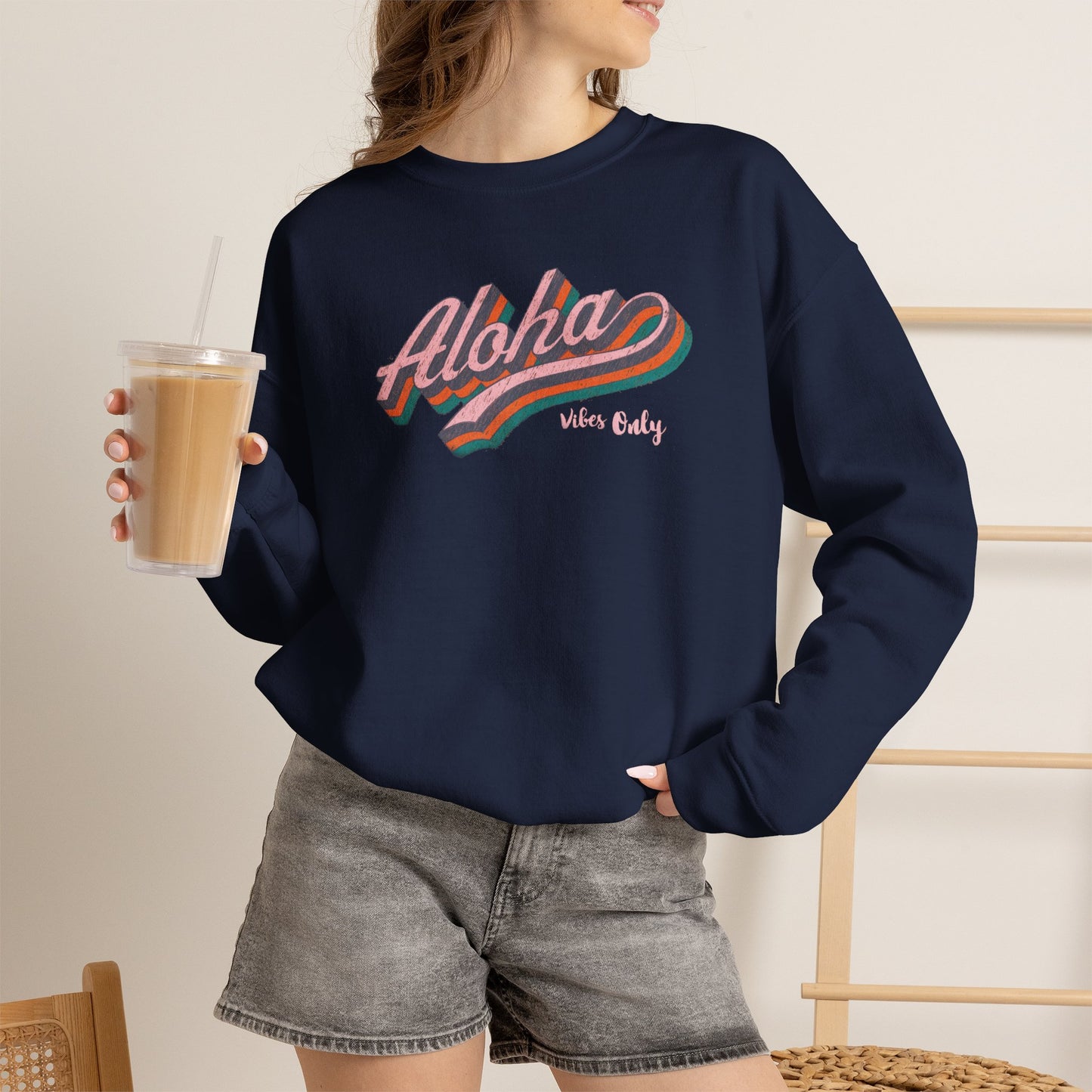 Aloha Vibes Only retro graphic crewneck sweatshirt featuring colorful vintage-inspired aloha lettering.