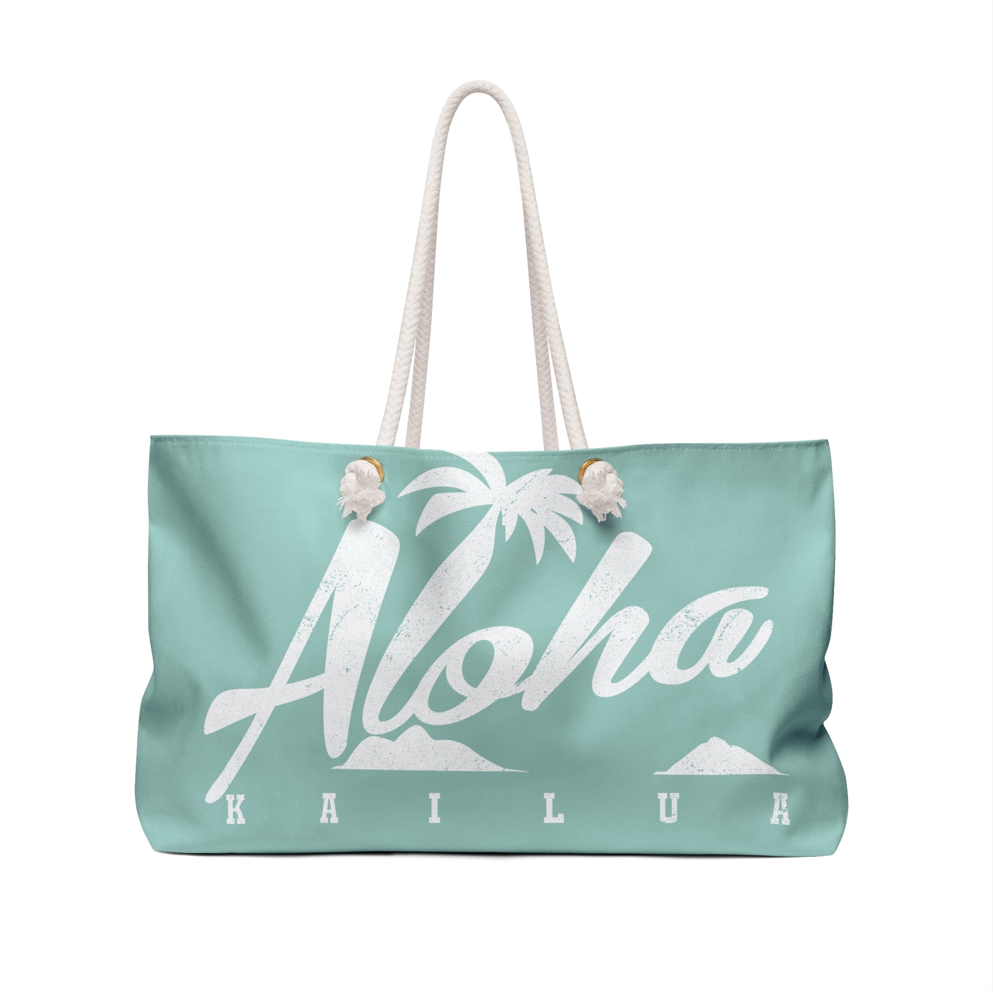 A mint green tote bag with white rope handles, featuring a white graphic print of palm trees, the word 'Aloha' in script, and the name 'KAILUA' printed below.