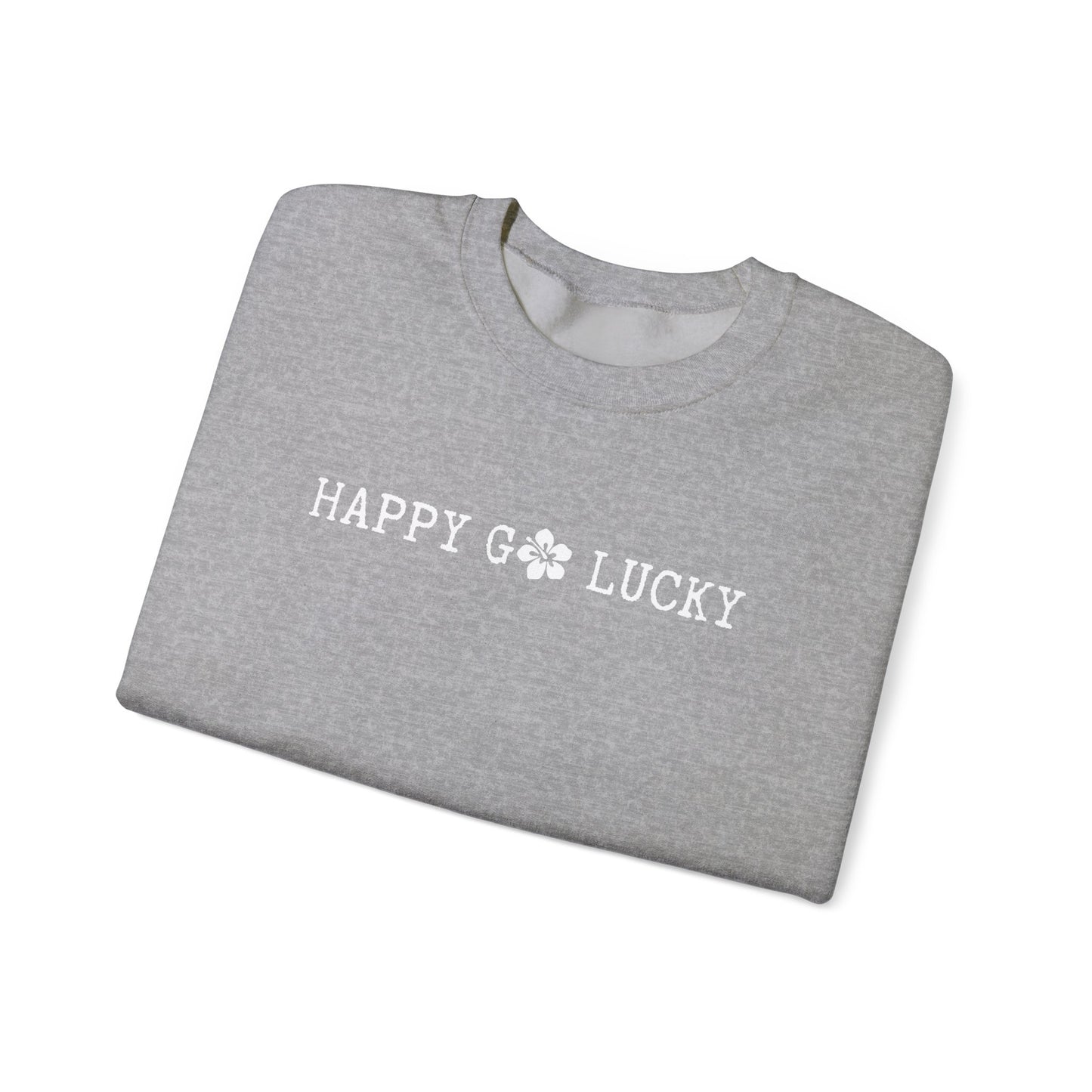 Folded gray t-shirt with 'Happy Go Lucky' text on a white background