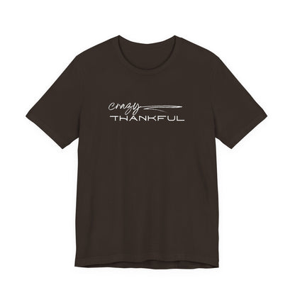 Dark Brown Crazy Thankful graphic t-shirt by Global Village Kailua