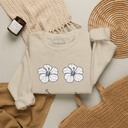 Tan Beige folded Happy Hibiscus Sweatshirt featuring a cheerful hibiscus flower smile design inspired by island life and aloha style.
