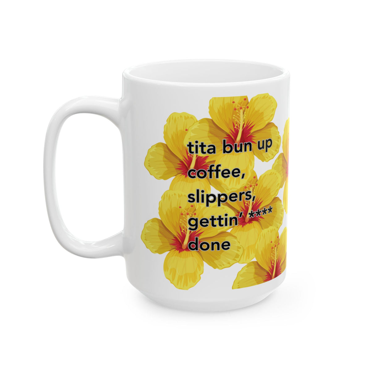 A white ceramic mug featuring a graphic print of yellow hibiscus flowers and the text 'tita bun up coffee, slippers, gettin' done' in black lettering, set against a plain white background.