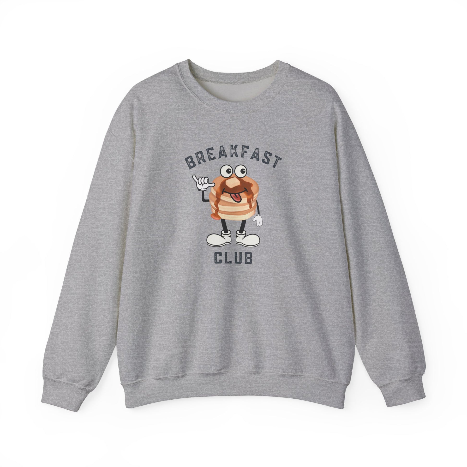 A heather grey crewneck sweatshirt featuring a cartoon graphic of a breakfast stack of pancakes character with the text 'BREAKFAST CLUB' printed on the front, displayed against a clean white background.
