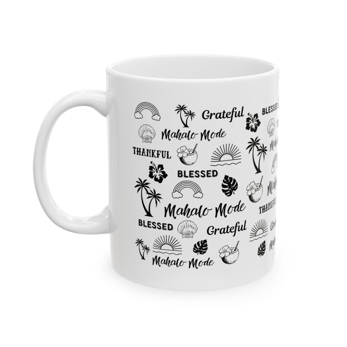 A white ceramic mug with a black tropical-themed print featuring palm trees, hibiscus flowers, monstera leaves, and words like 'Grateful', 'BLESSED', and 'Mahalo -Mode' on a plain white background.