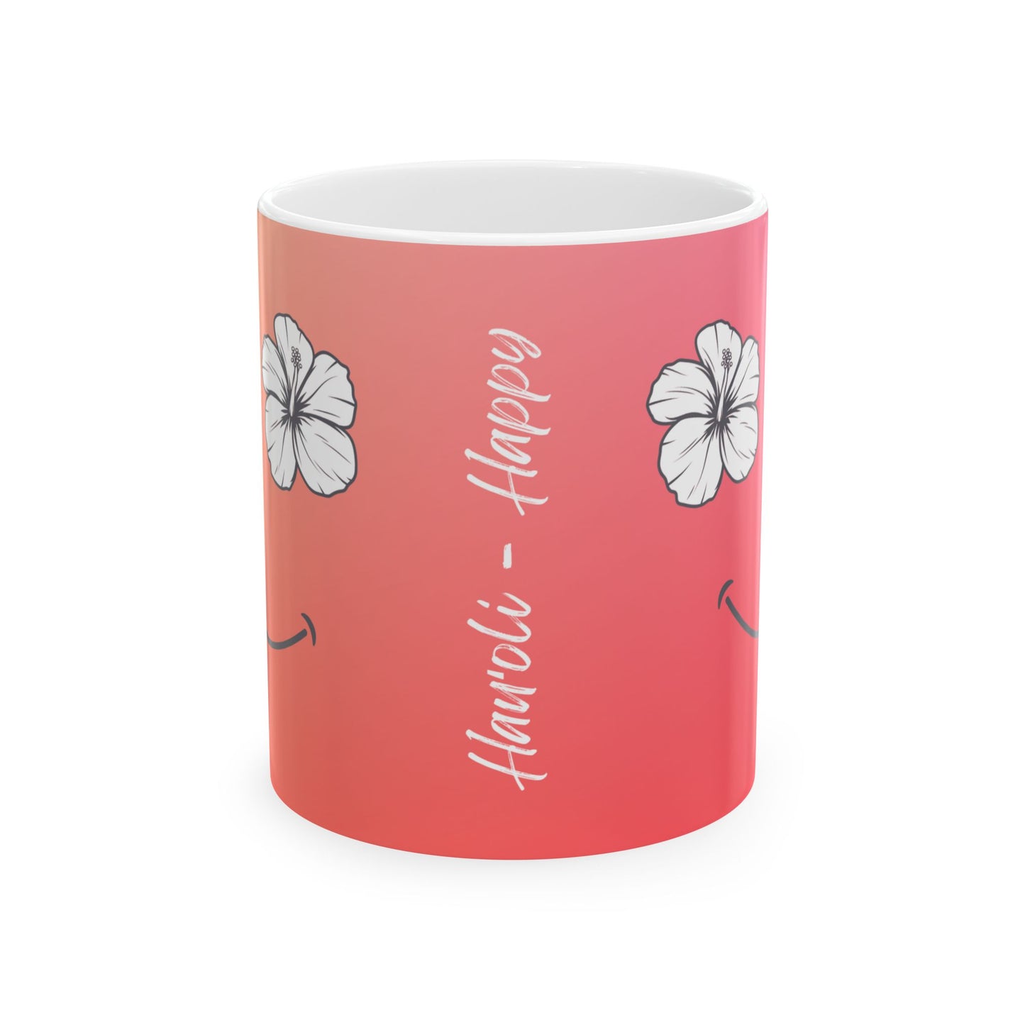 A cylindrical ceramic mug with a coral pink to red gradient, decorated with white hibiscus flowers and the vertical text 'Hauʻoli- Happy' in white script.