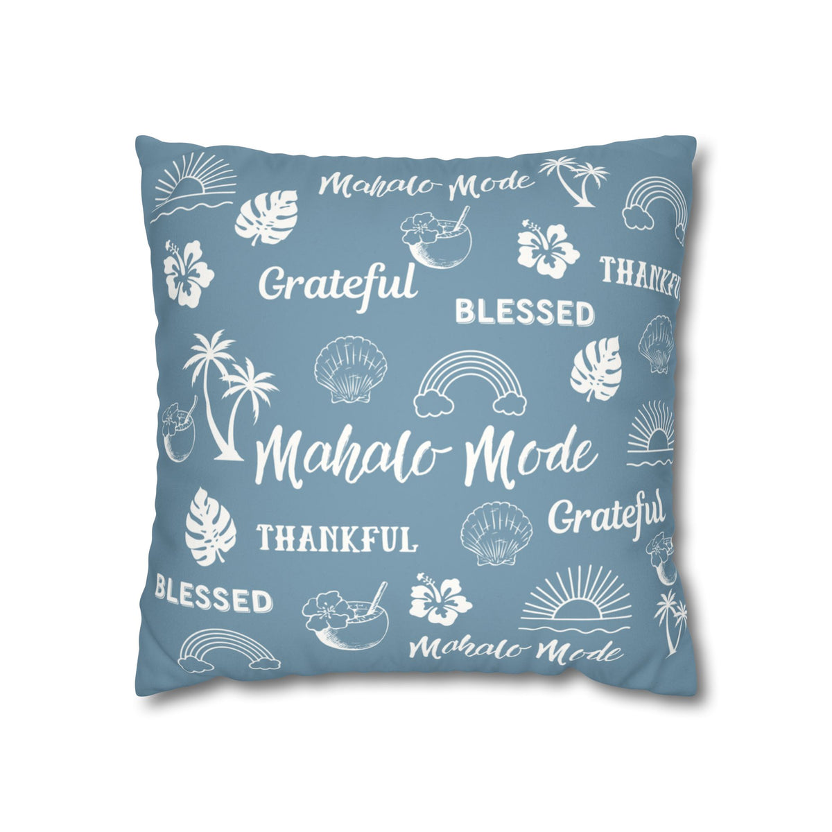 A square throw pillow in a dusty blue color, printed with white tropical-themed illustrations and words including 'Mahalo Mode', 'Grateful', 'Blessed', and 'Thankful'.