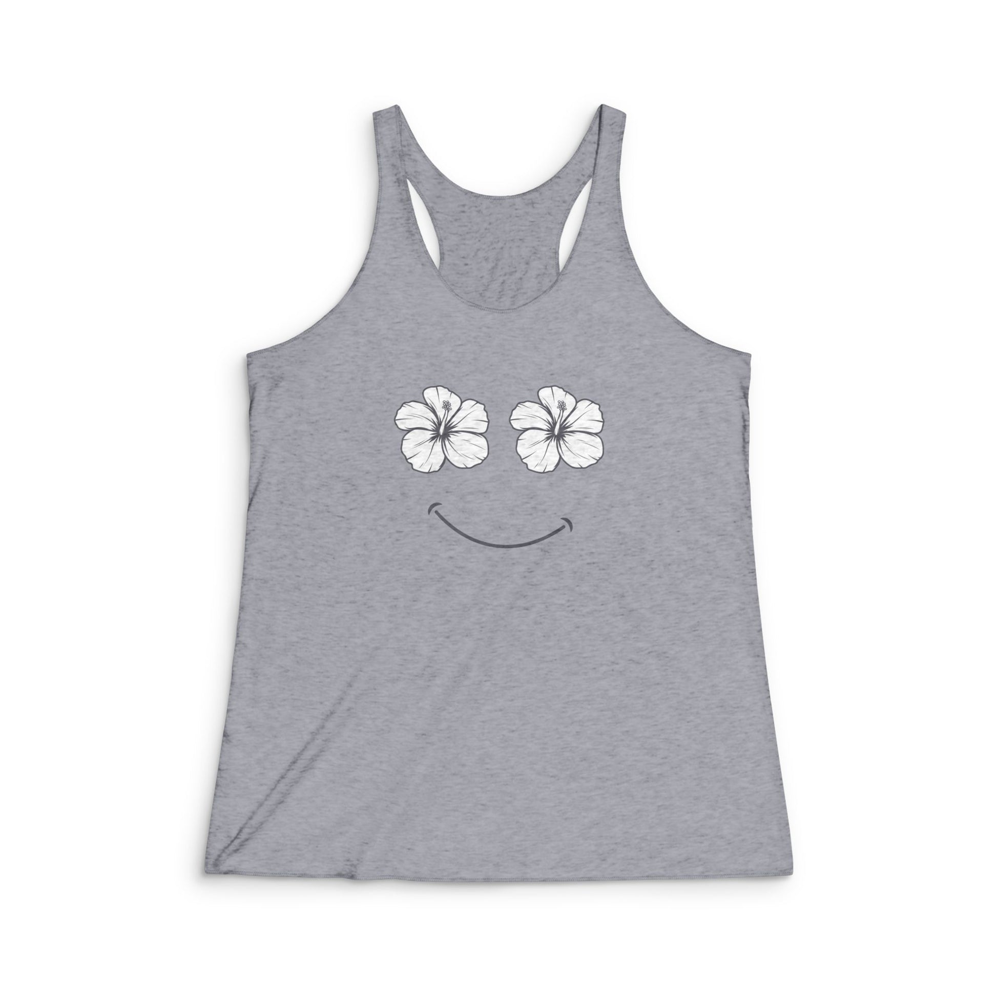 A heather gray racerback tank top featuring a white graphic of two hibiscus flowers forming eyes and a curved smile on the chest, displayed against a plain white background.