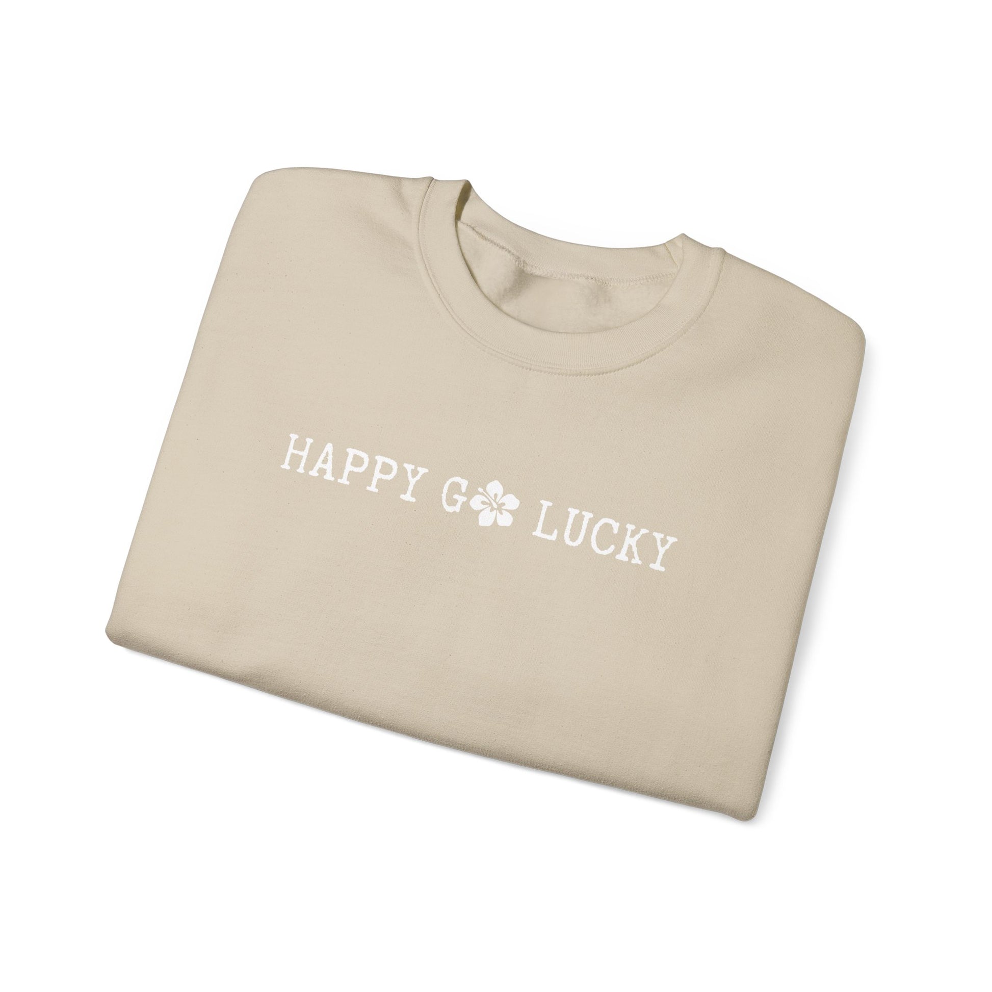 Beige t-shirt with 'HAPPY GO LUCKY' text on a white background
