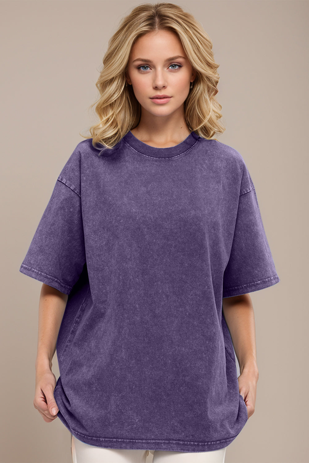 Woman wearing a purple t-shirt against a beige background