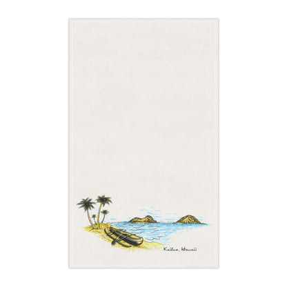 An off-white rectangular tea towel featuring a hand-drawn style illustration of a tropical beach scene near the bottom, with palm trees, a canoe, small rocks, blue water, and the text 'Kailua, Hawaii' in script.