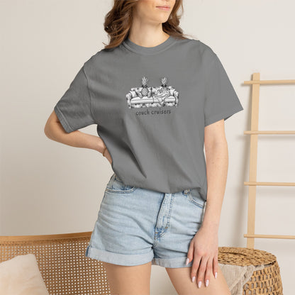 Woman wearing grey Couch Cruisers Comfort Colors graphic tee with denim shorts
