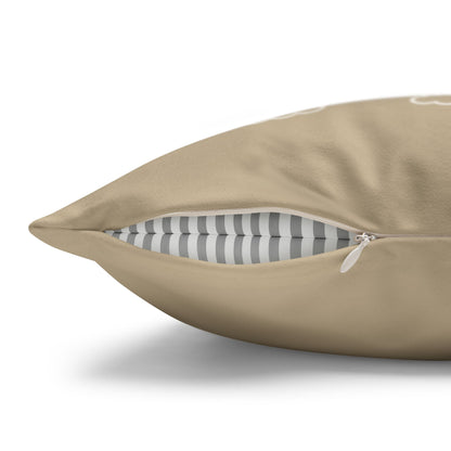 A close-up of a beige throw pillow with a zipper opening, showing a gray and white striped inner lining, on a white background.
