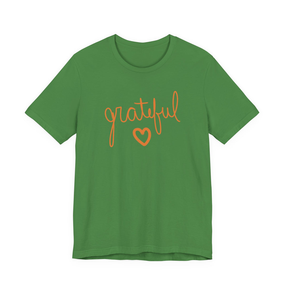 A green short-sleeve crewneck t-shirt featuring the word 'grateful' in orange cursive script and an orange heart outline on the front, displayed against a solid white background.