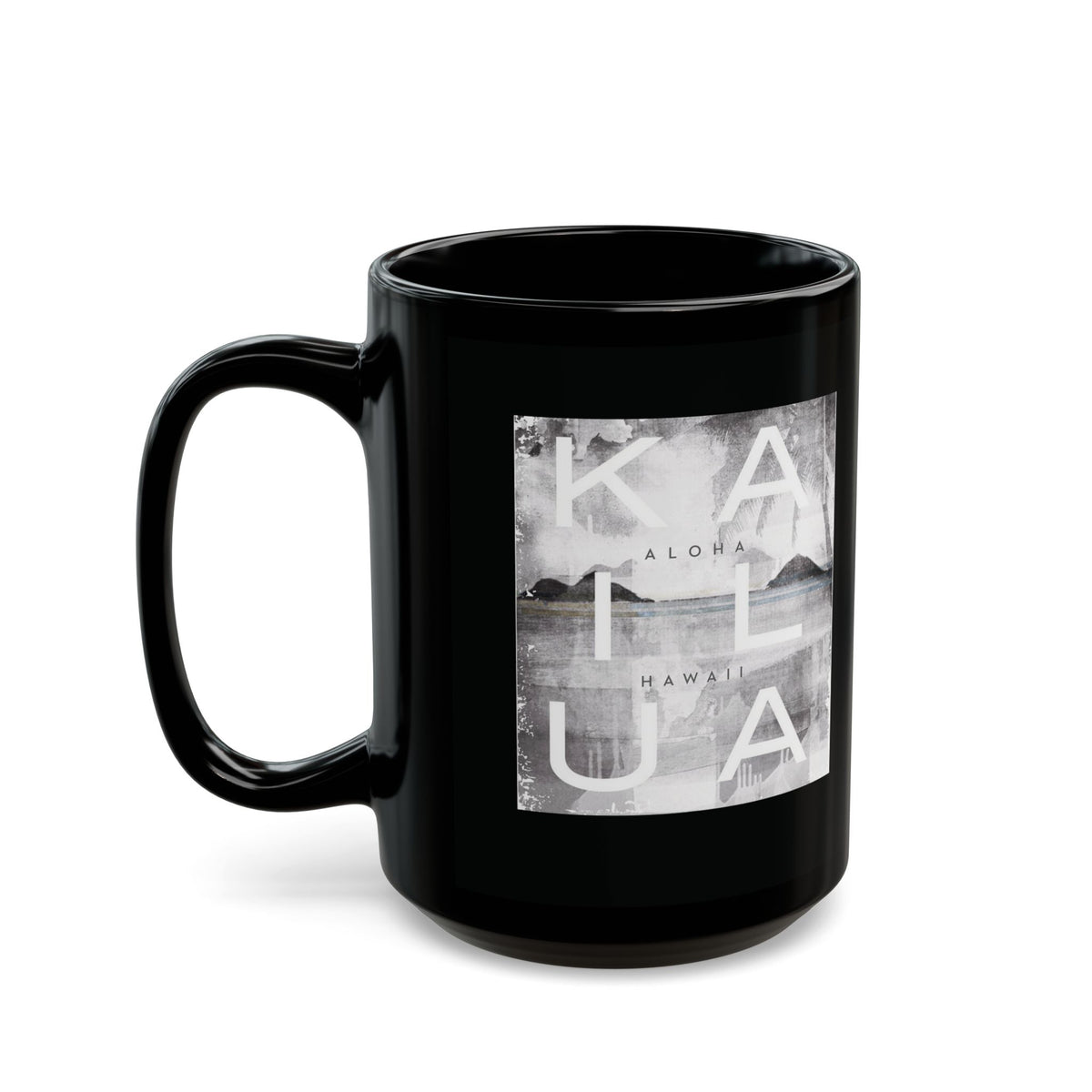 A glossy black ceramic mug featuring a square grayscale graphic print on the front with the words 'KAILUA', 'ALOHA', and 'HAWAII' over a landscape image, shown on a white background.