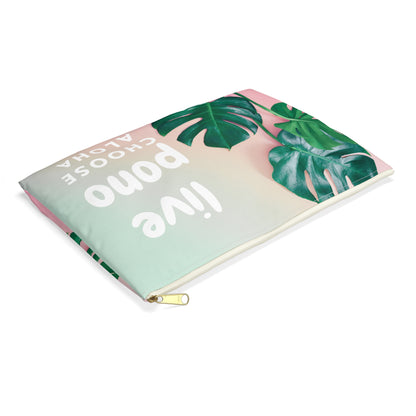 A rectangular zippered pouch featuring a tropical design with green monstera leaves on a pastel gradient background transitioning from mint green to pink, with white text reading 'live pono choose aloha'.