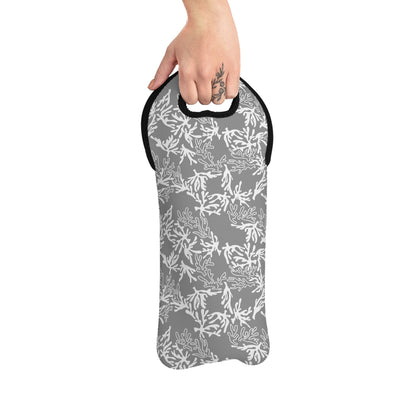 Sharkskin grey insulated neoprene wine tote bag with a white coral reef print, black trim and built-in carrying handle.