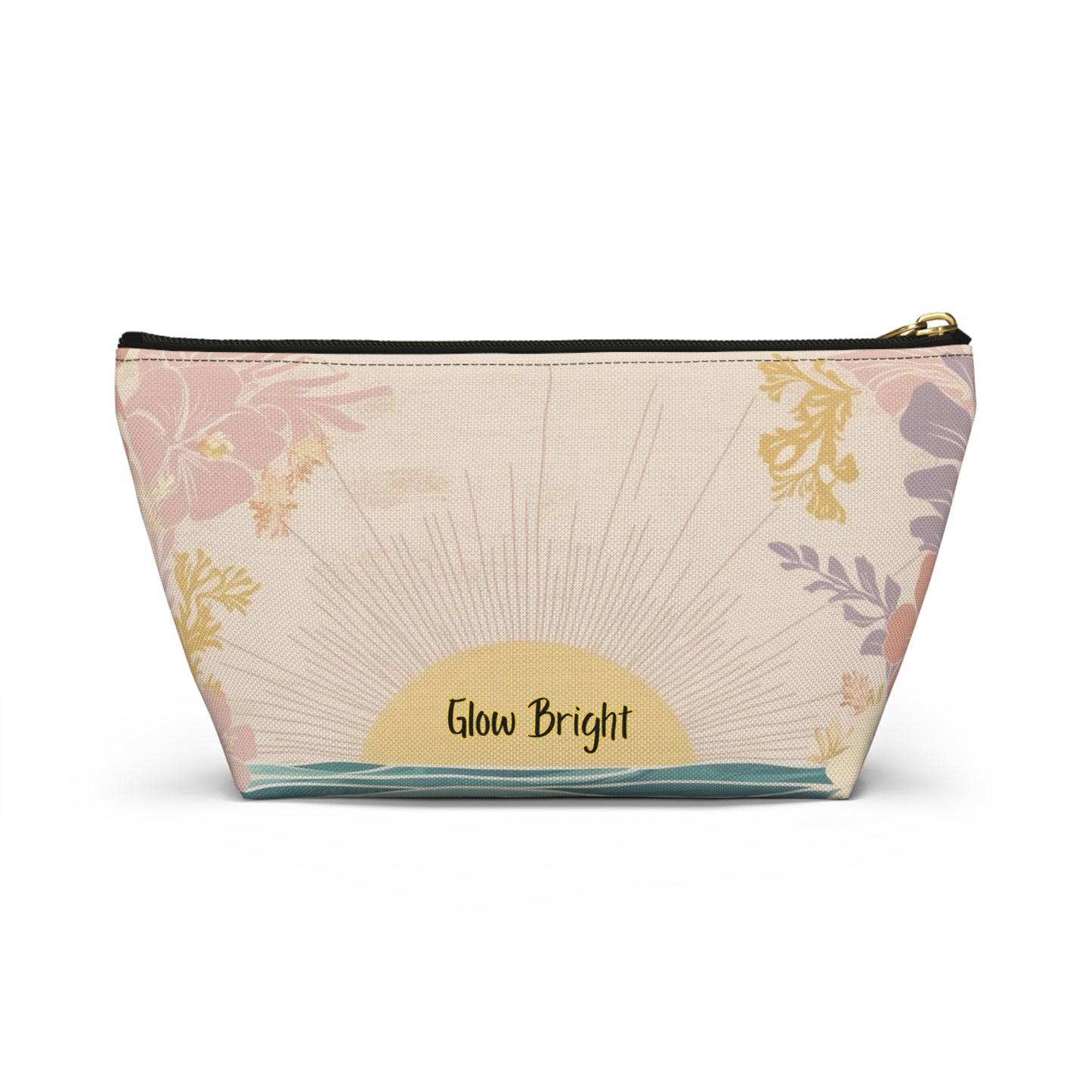 A zippered cosmetic pouch with a retro sunset design, featuring a cream background with pink and purple floral elements, a yellow sunburst, and the text 'Glow Bright' on the front.