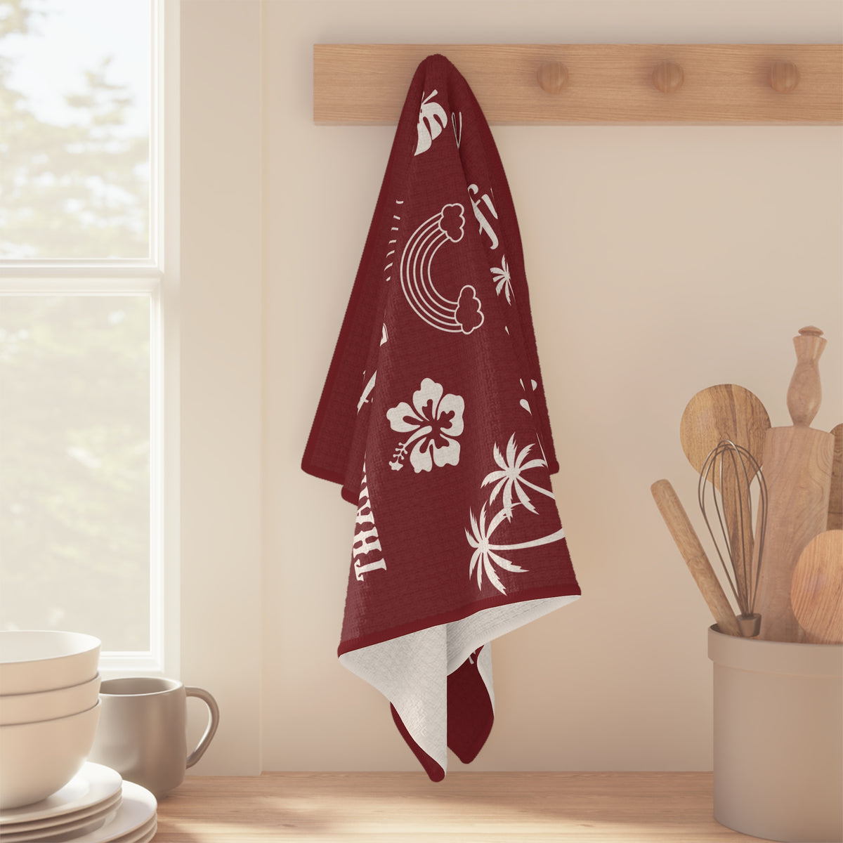 Burgundy Mahalo Mode kitchen towel with thankful grateful blessed and tropical island motifs hanging from a wood peg