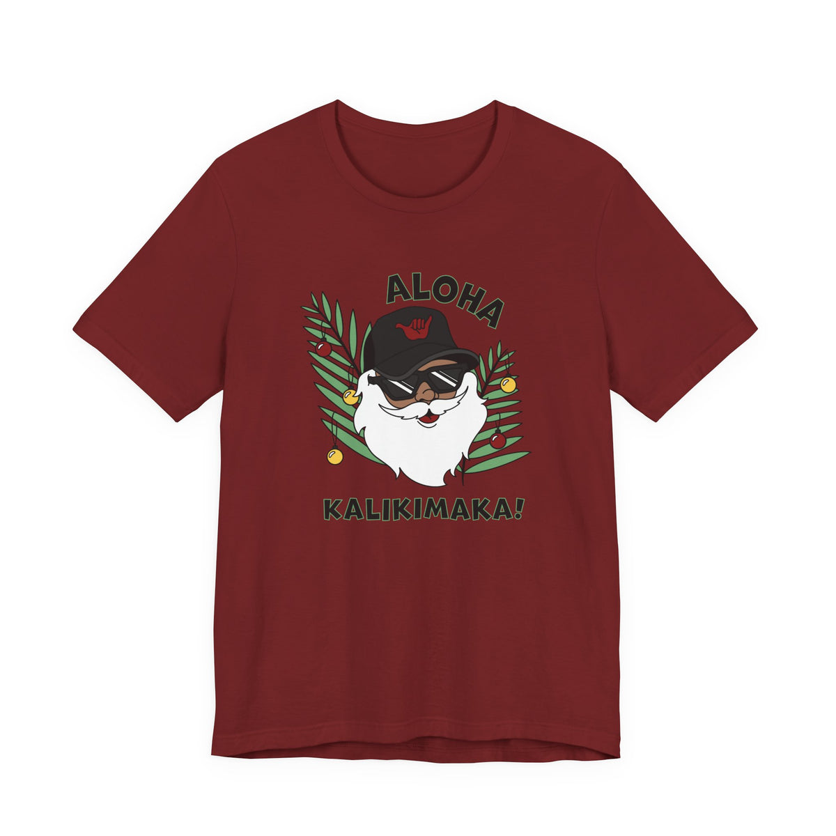 Cardinal Red Santa Kalikimaka unisex T-shirt with hand-drawn Santa wearing sunglasses and throwing a shaka surrounded by tropical palm leaves.