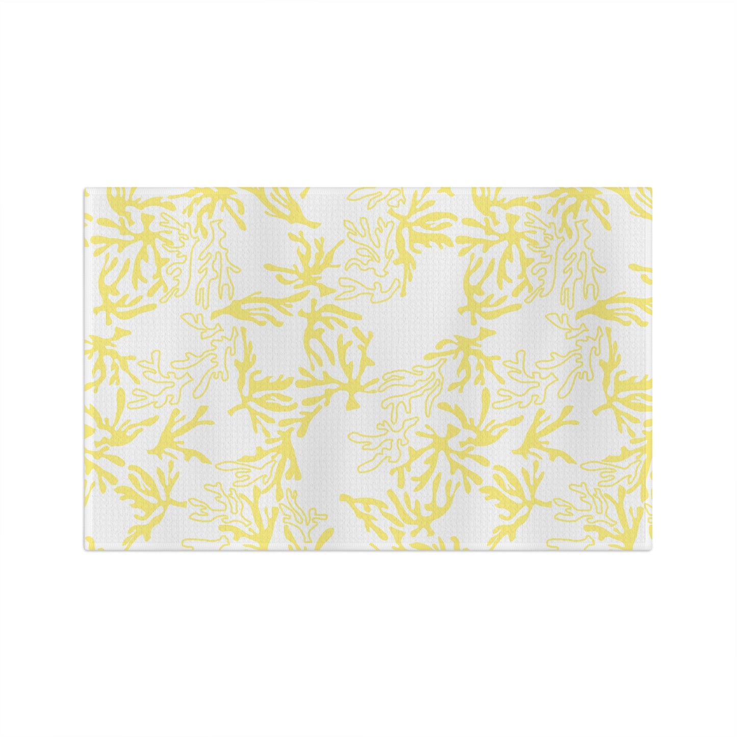 Microfiber kitchen towel featuring the original Global Village Kailua Coral Sunshine pattern in soft yellow and white, adding a bright island-inspired touch to any kitchen.